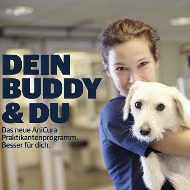 A person holding a dog.